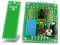 Kit elettronico con sensore di umidità verde 'Liquid Sensor' e circuito stampato, dotato di chip, resistenze e LED, per la misurazione dell'umidità.