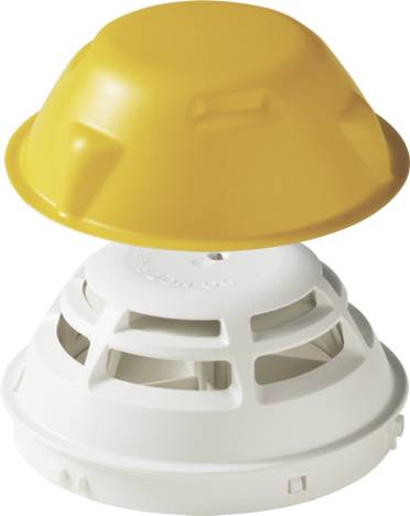 Rilevatore di fumo giallo e bianco con coperchio rimovibile. La parte superiore gialla è una copertura che protegge il sensore sottostante.