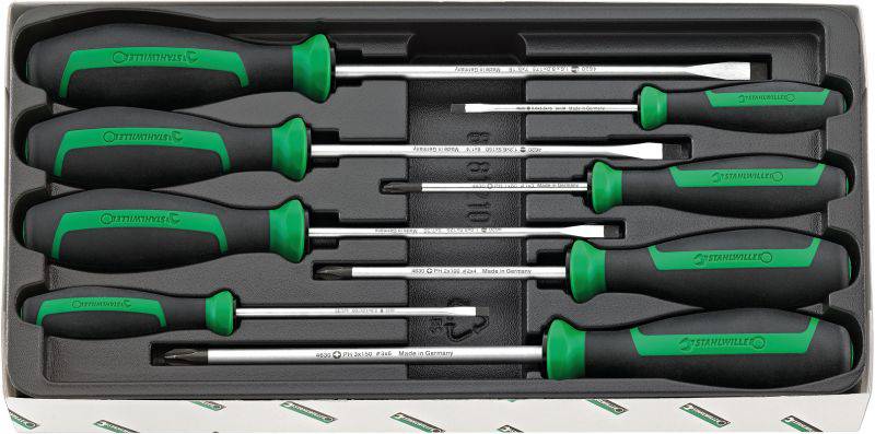 Set di otto cacciaviti in una scatola, verde-nero con dimensioni diverse, allineati in un organizer di plastica.