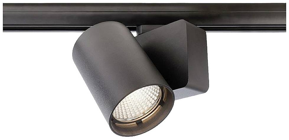 Proiettore nero a forma di cilindro, montato su una guida, che può essere orientato per illuminare un'area specifica.