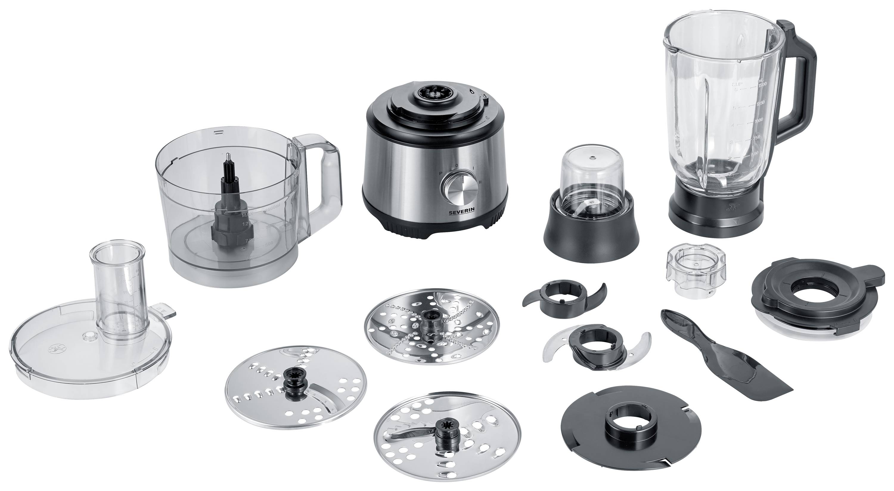 Vari componenti e accessori di un mixer da cucina, tra cui il corpo principale, la ciotola, le lame, il coperchio e i dischi, disposti su un tavolo.