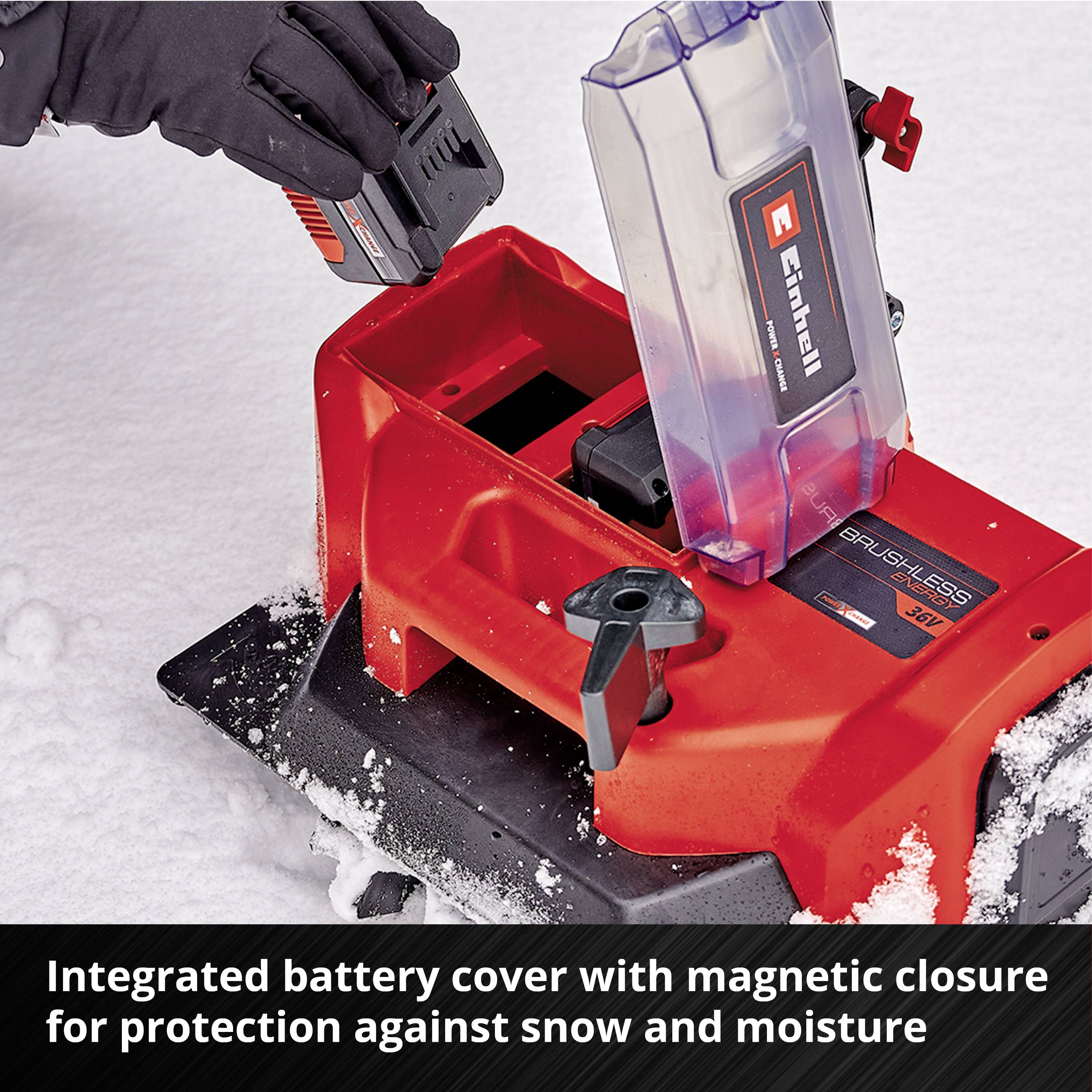 Un dispositivo con sistema integrato di copertura della batteria che offre protezione contro neve e umidità. È visibile una leva rossa.