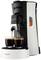 Macchina da caffè con due tazze che raccolgono il caffè appena preparato. Involucro nero e bianco con un pannello di controllo semplice.