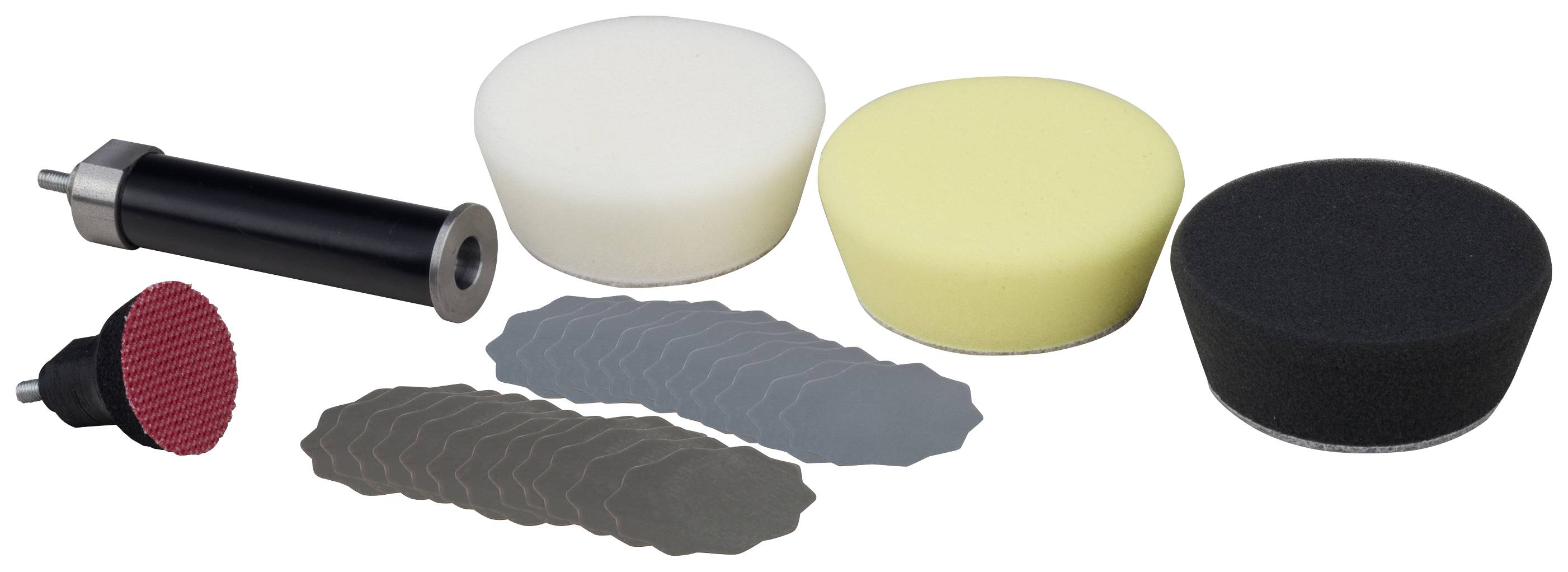 Diversi accessori per lucidatura e tamponi in spugna di varie dimensioni e colori, accanto a un lucidatore manuale nero.