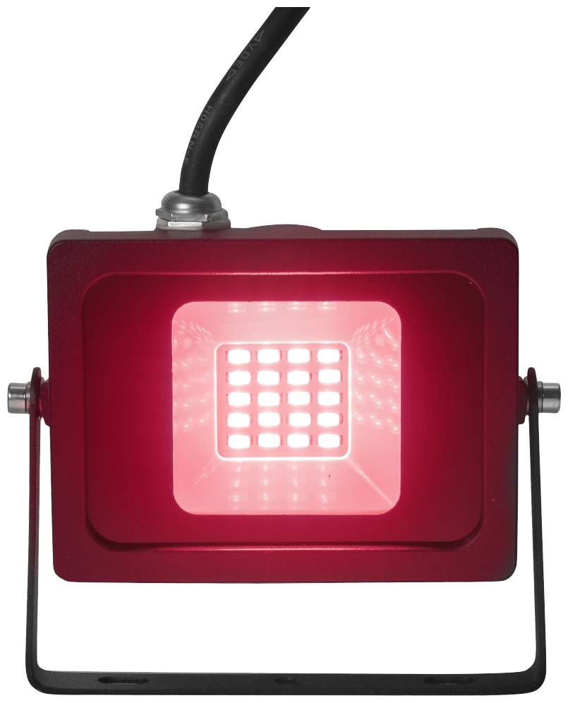 Un proiettore a LED rosso illumina intensamente. Il proiettore ha una forma quadrata con un alloggiamento robusto e un supporto regolabile.