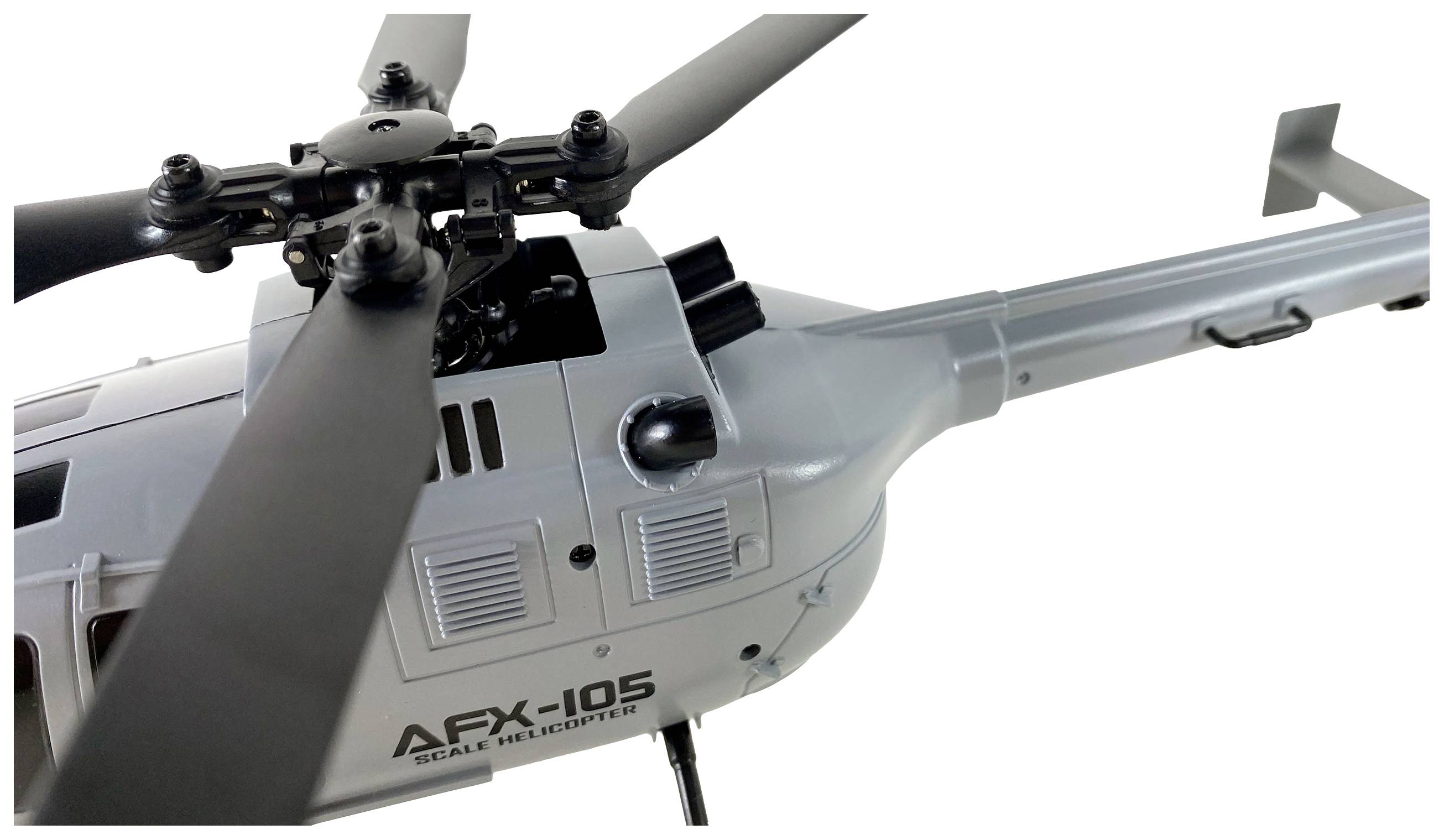 Elicottero giocattolo con quattro pale rotore e scritta 'AFX-105 Scale Helicopter'. Cannoni e struttura dettagliata visibili sulla fusoliera.