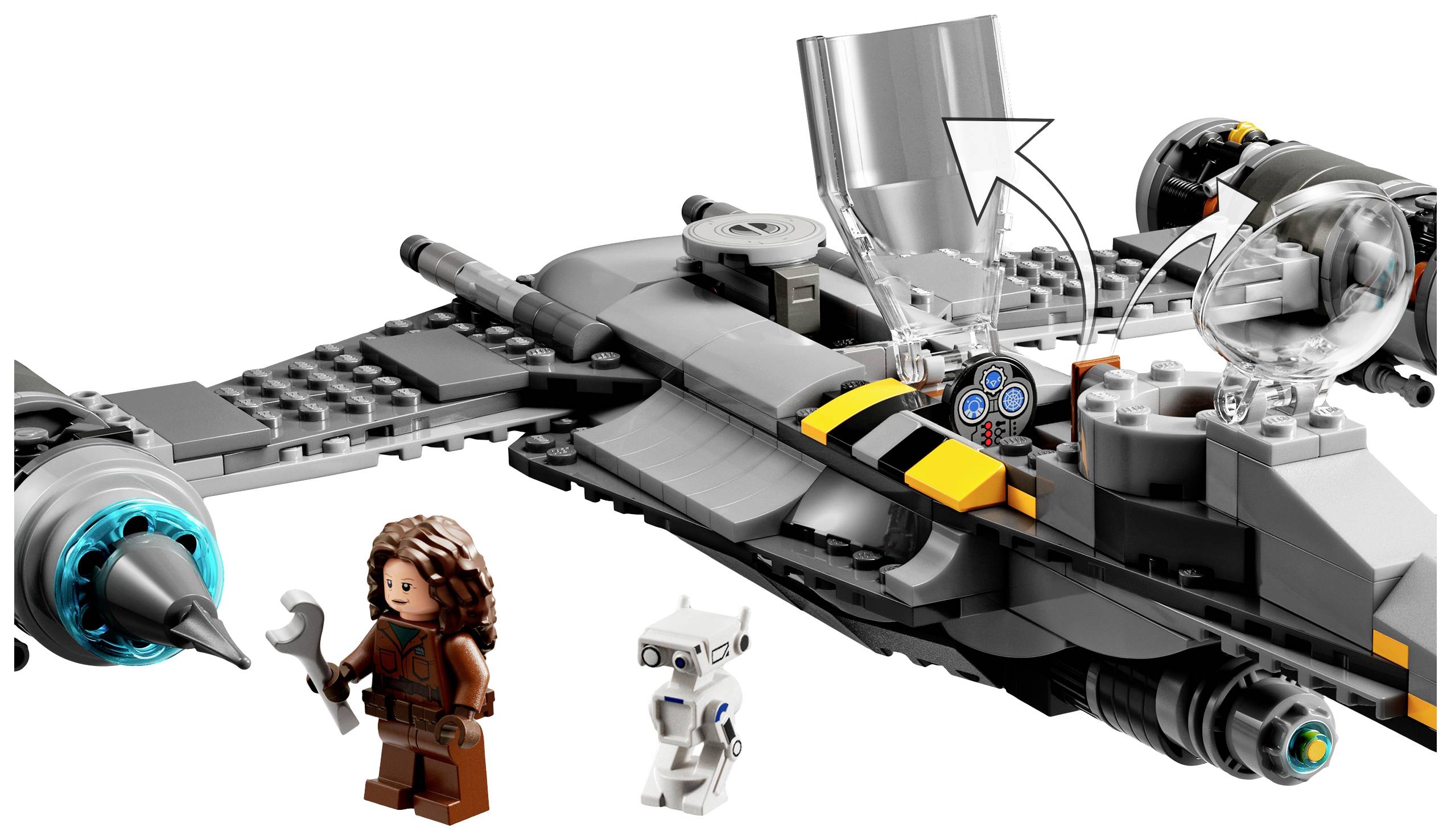 Astronave LEGO con parti mobili e due minifigure: una persona con un attrezzo e un robot. Rappresentazione di un giocattolo di fantascienza.