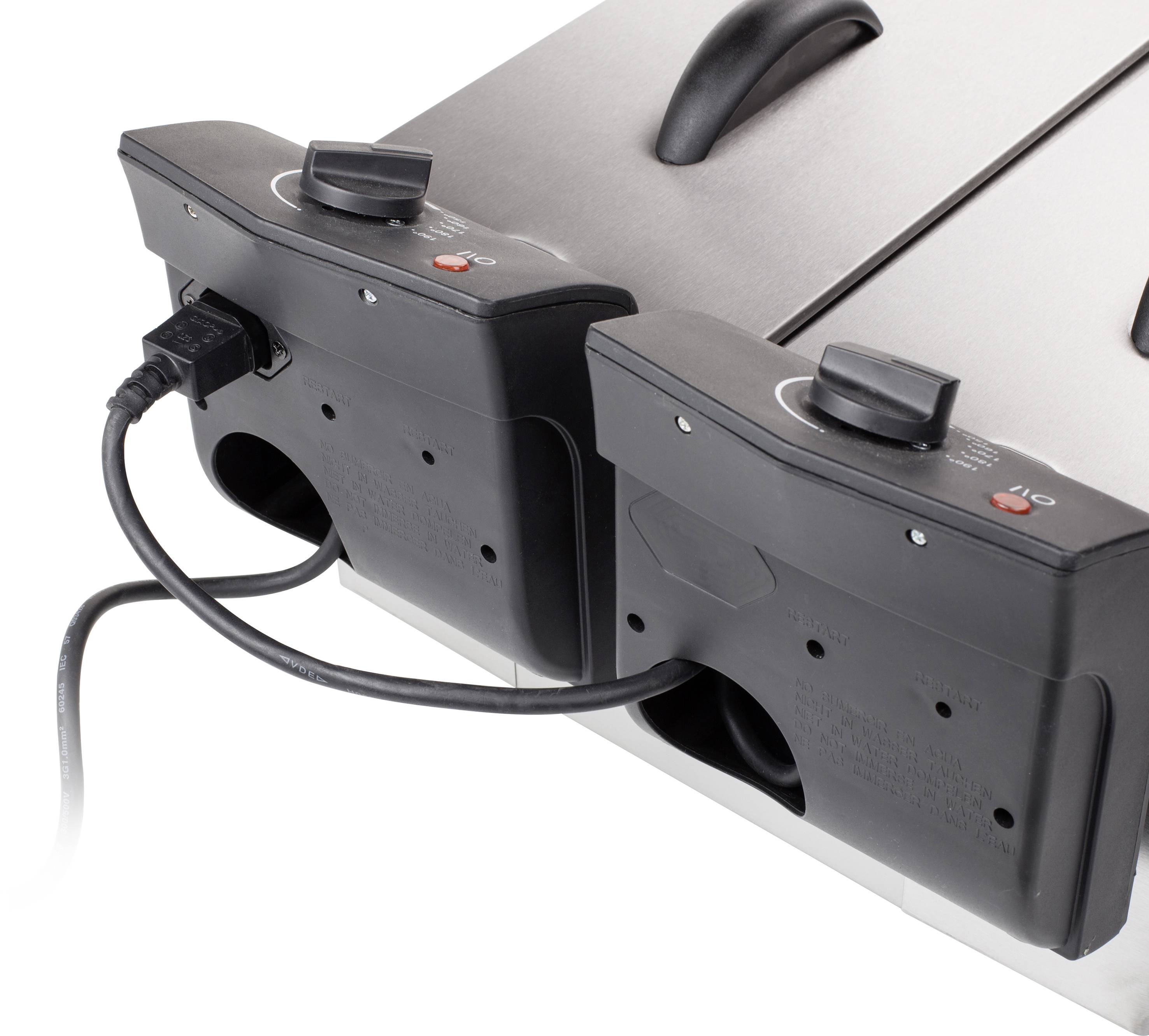 Due dispositivi elettrici per grigliare affiancati, con regolatori di temperatura e cavi di alimentazione collegati; con focus sugli elementi di controllo.