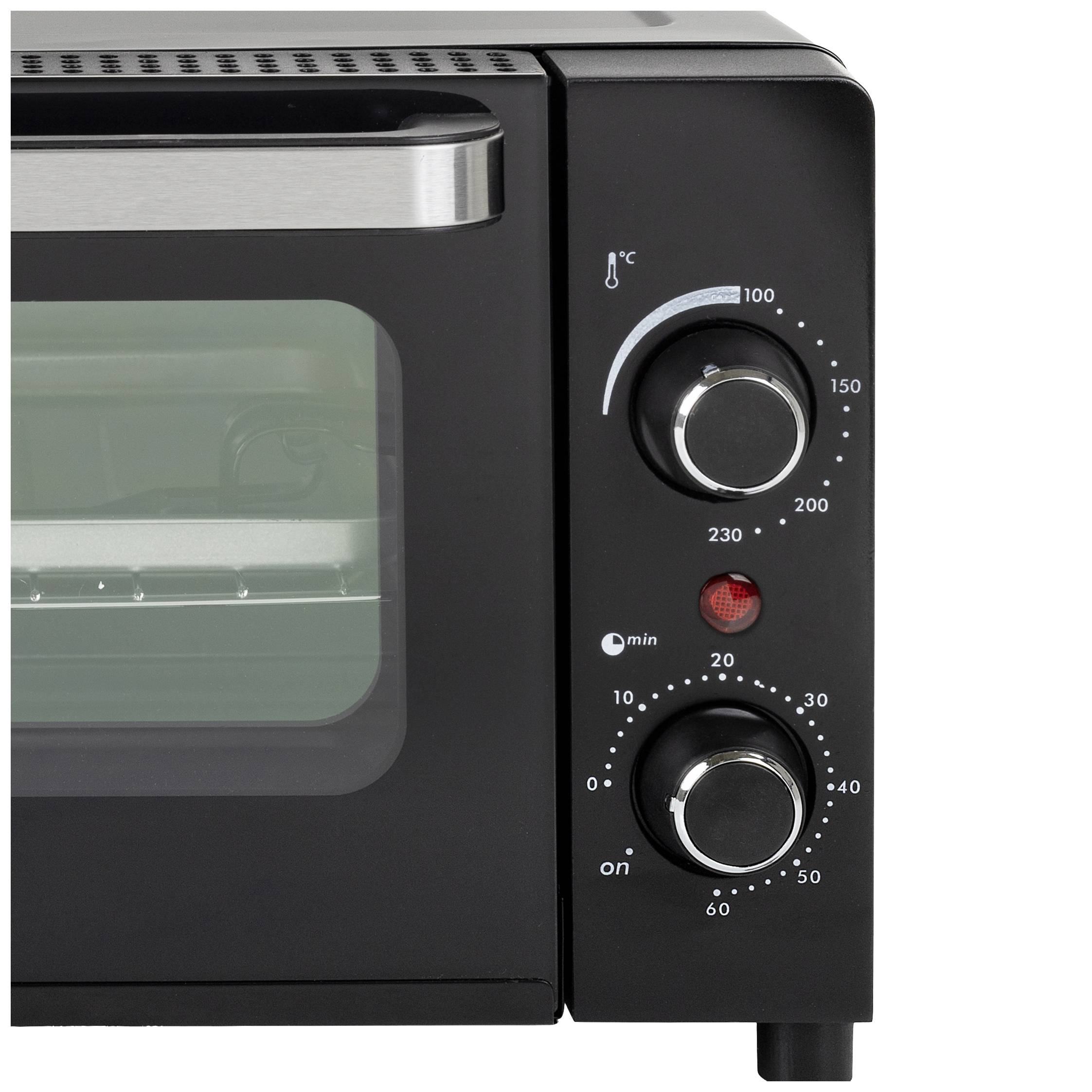 Mini forno nero con porta in vetro. Due manopole a destra per la temperatura e il timer.