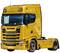 Camion Scania giallo del 1969, con scritta commemorativa '50 anni'. Nessun rimorchio, conducente o ambiente visibile.