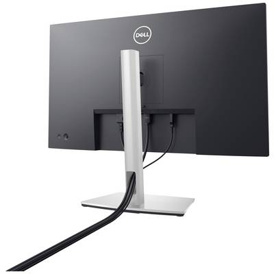 Un monitor desktop visto da dietro con diversi cavi collegati, montato su un tavolo.