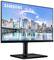 Monitor Samsung con un'immagine di paesaggio urbano sullo schermo, presentato come 'Monitor Professionale' per applicazioni aziendali.