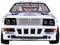 Un'auto da rally con la scritta 'Martini Racing' sul cofano. Ha i marchi 'Fiat Lubrificanti' e 'Carello' sul paraurti.
