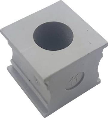 Pezzo quadrato grigio in plastica con foro cilindrico centrale.
