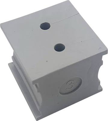 Blocco quadrato grigio in plastica con due fori e un numero '3' marcato su un lato.