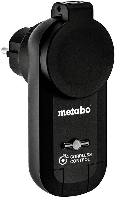 Dispositivo di controllo cordless Metabo nero con attacco e spina di alimentazione e grande alloggiamento circolare, mostrato su sfondo bianco.