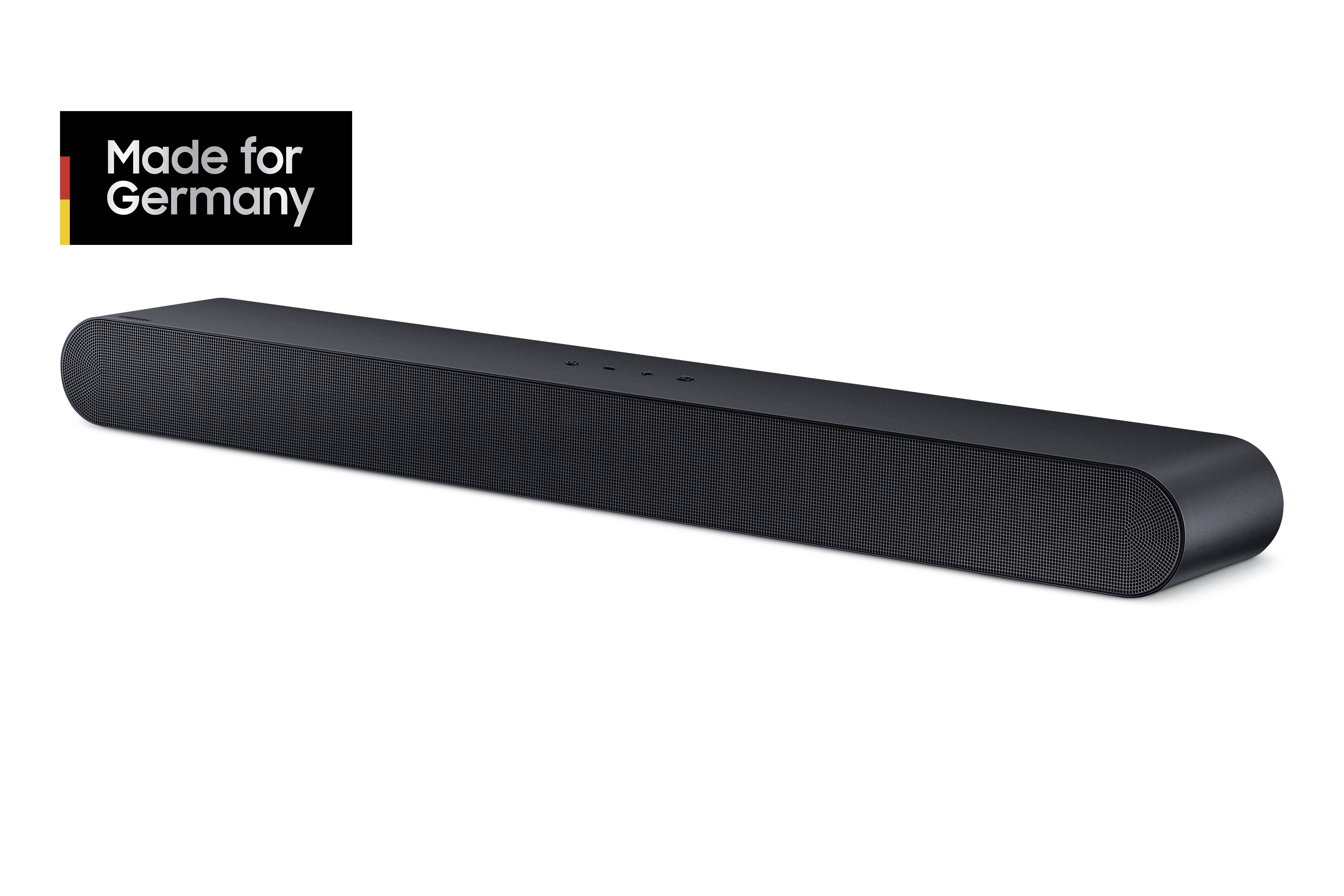 Una soundbar nera, affiancata da un logo con la scritta 'Made for Germany' in bianco su sfondo nero con un accento di colore.
