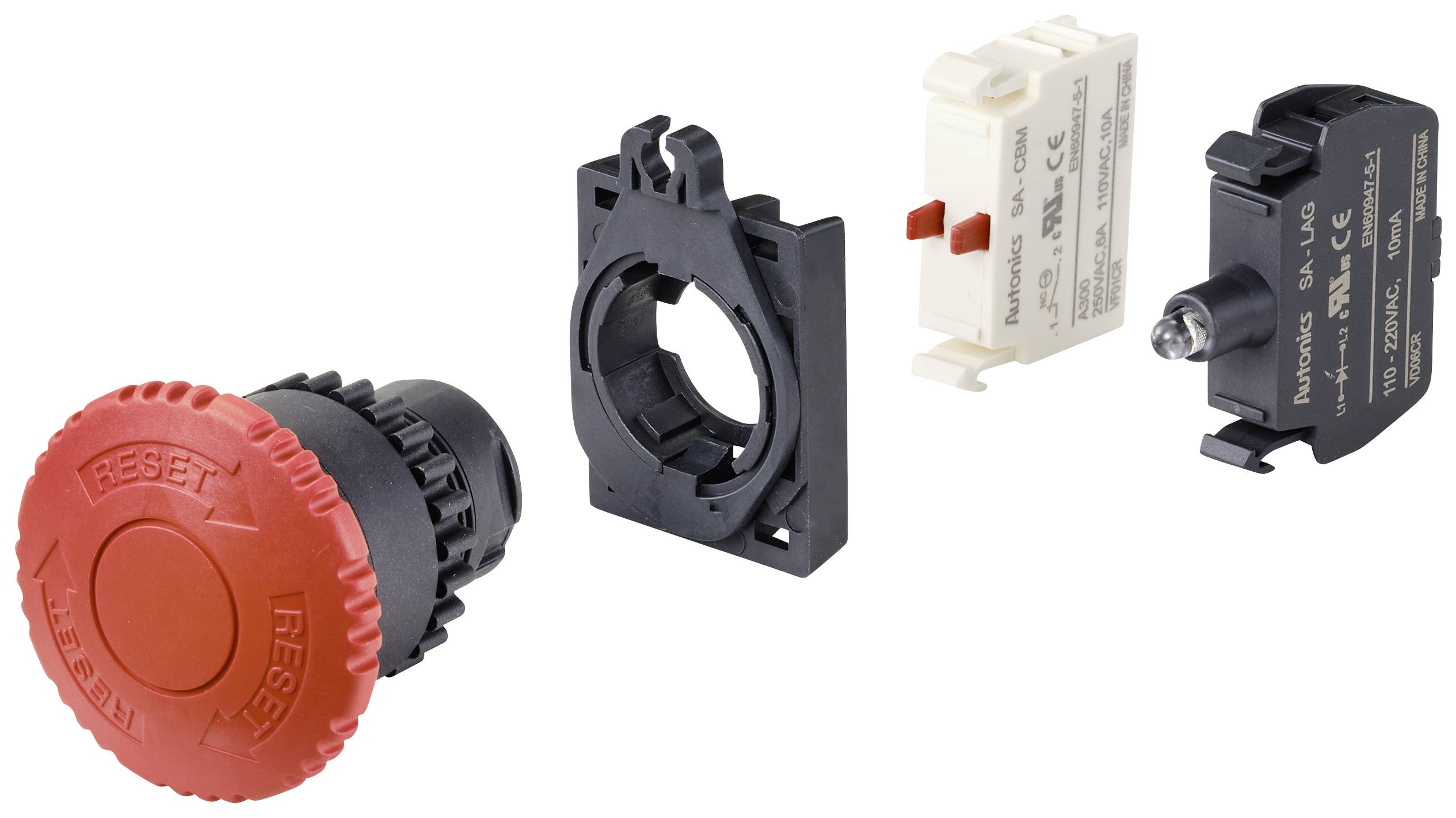 Pulsante di emergenza rosso smontato con base, involucro in plastica e componenti elettrici.