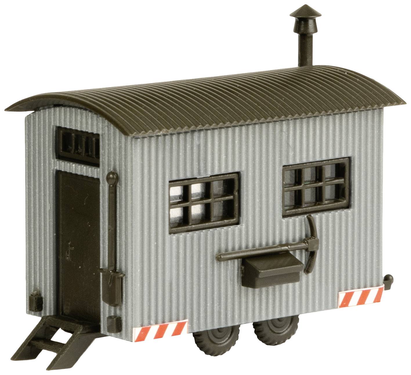 Modello in miniatura grigio di un capannone su ruote con finestre e camino, trasportabile e dall'aspetto industriale.