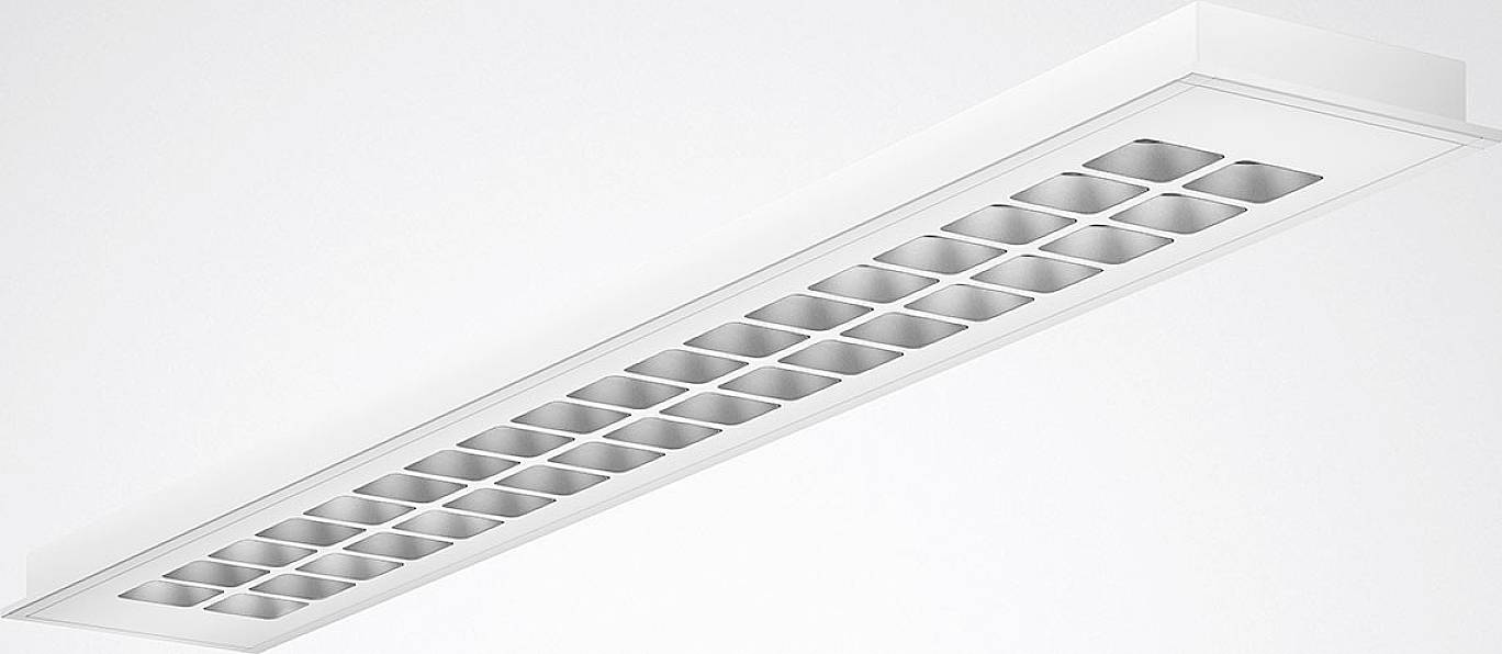 Una plafoniera rettangolare con diverse piccole aperture quadrate.