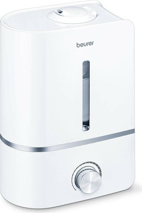 Un umidificatore bianco con finestra trasparente e manopola di regolazione, con il nome del marchio 'beurer' in alto.