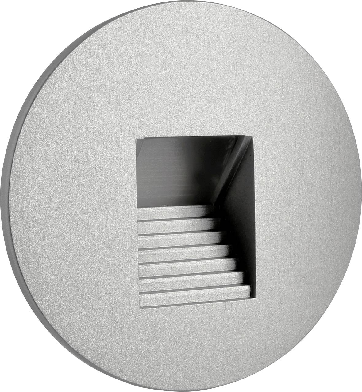 Applique da parete rotonda in argento con apertura rettangolare ed elementi a gradini all'interno.