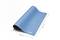 Tappetino blu arrotolato di 'Weller', con dimensioni 900 mm x 600 mm e dischi metallici agli angoli.