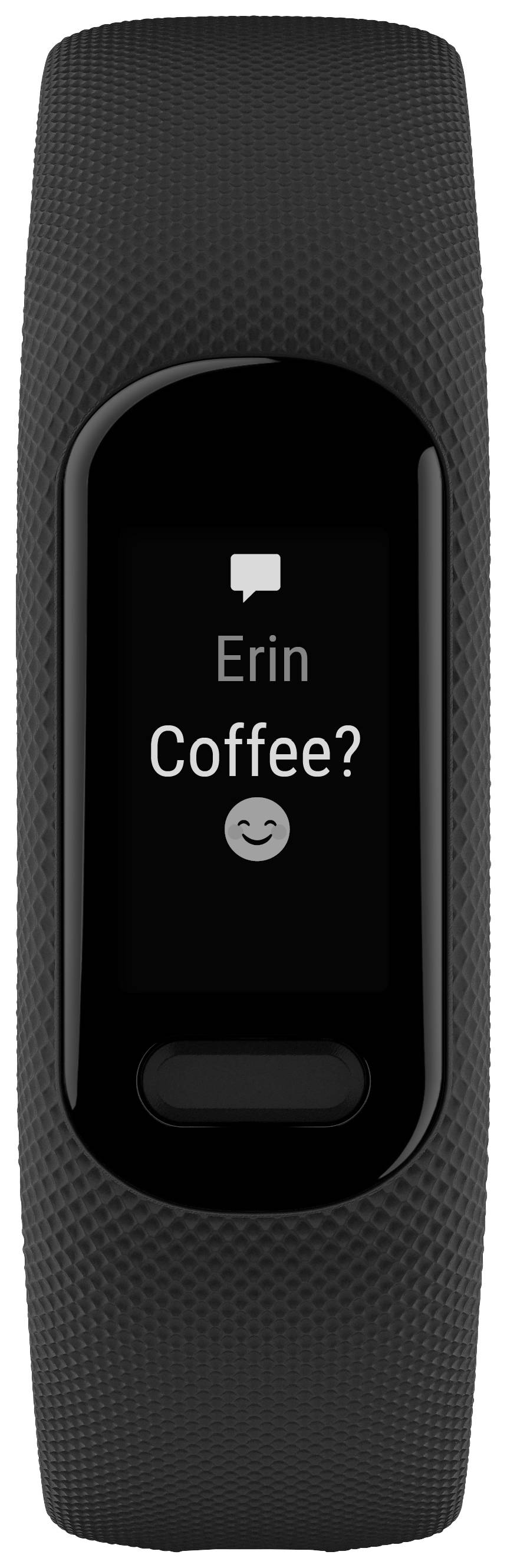 Tracker fitness nero-grigio con un messaggio sul display: 'Erin: Caffè?' seguito da un'emoticon sorridente.