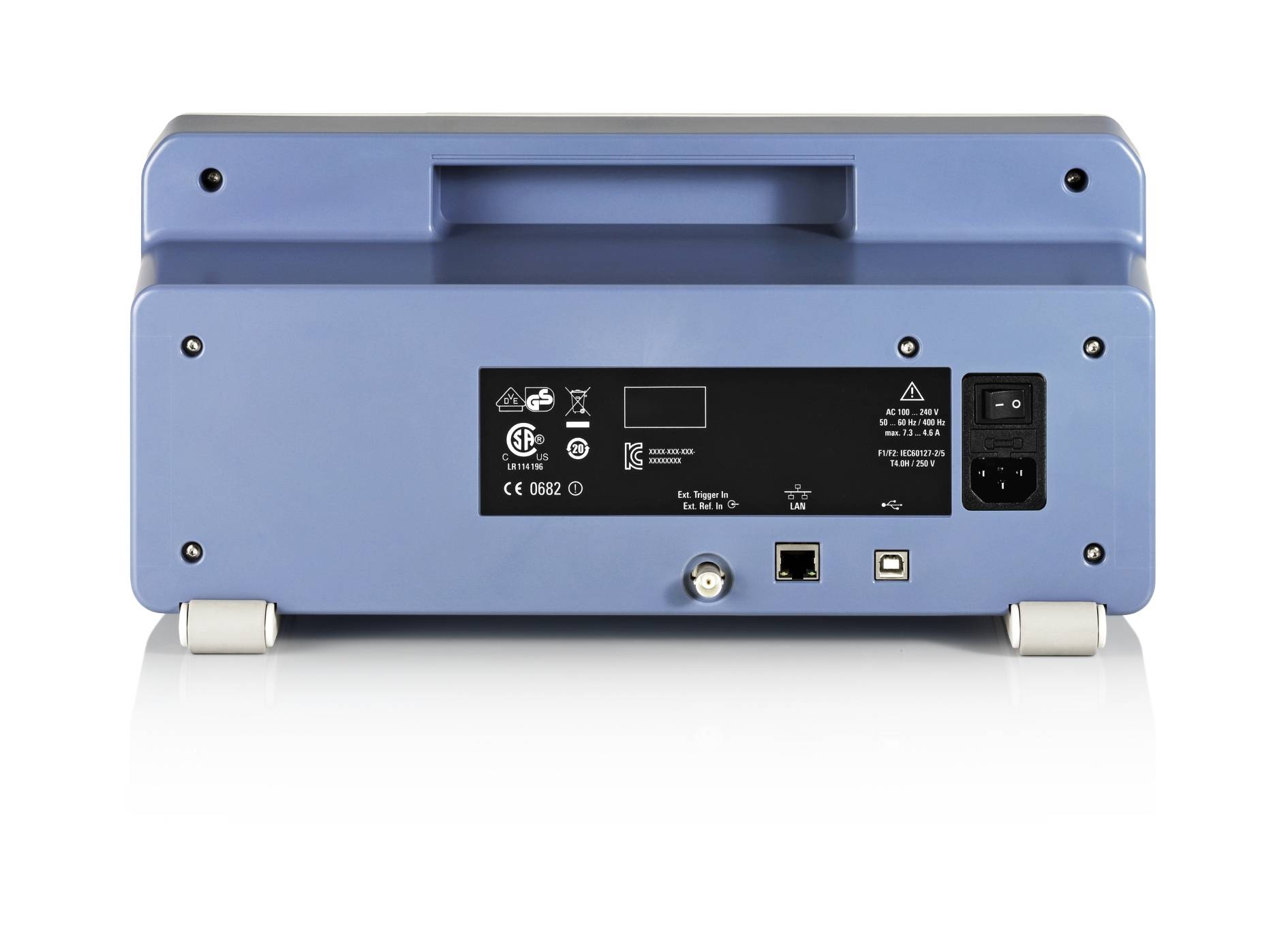 Vista posteriore di un dispositivo elettrico blu con due impugnature. Mostra diversi connettori e simboli di sicurezza.