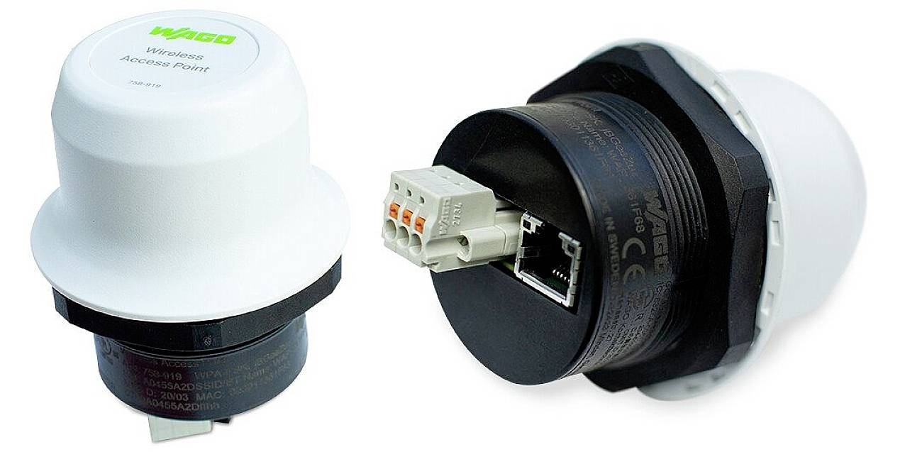 Due punti di accesso wireless bianchi di forma rotonda con connessioni sul retro utilizzate per il collegamento di rete.