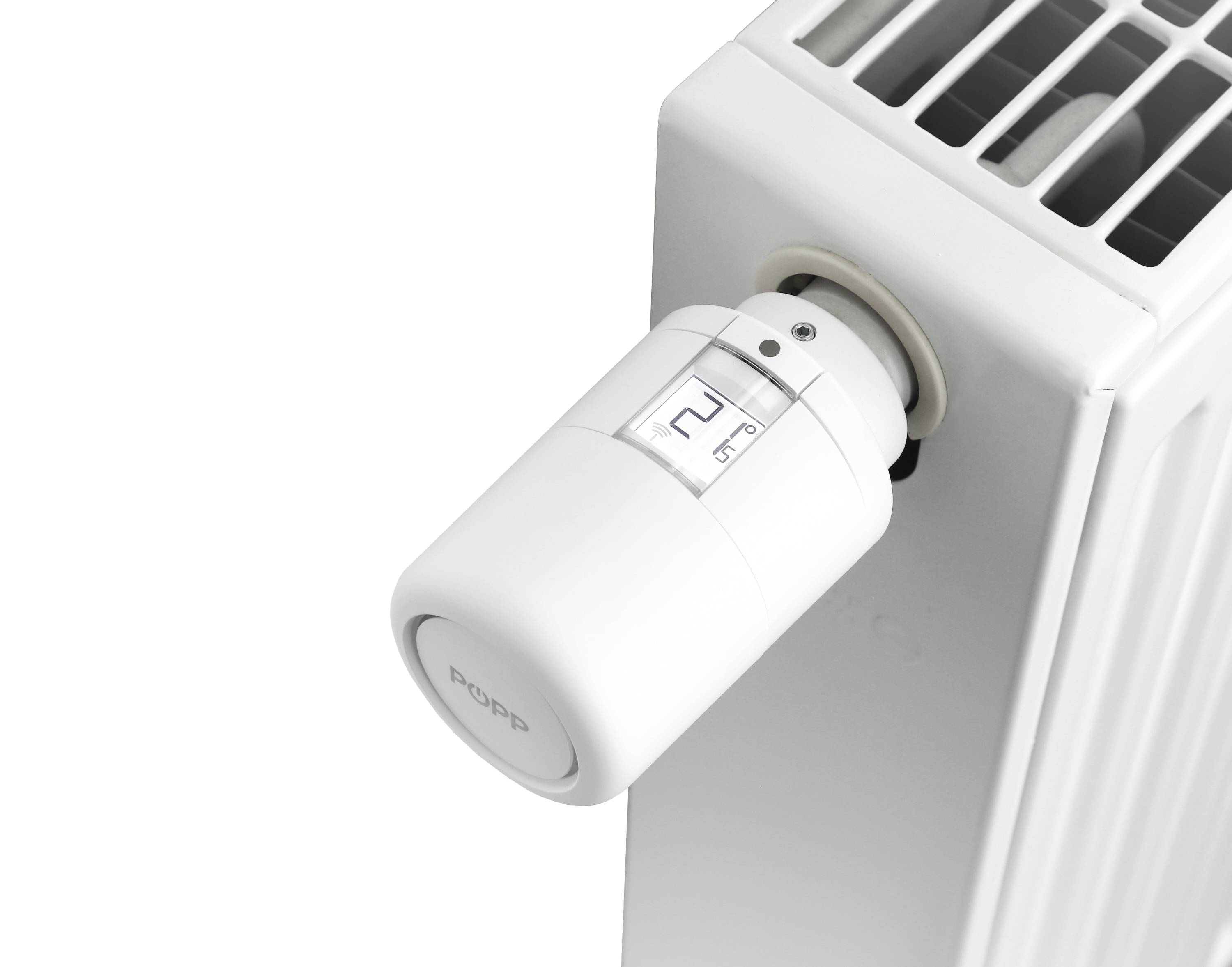 Un regolatore del termosifone bianco indica 22 gradi Celsius.