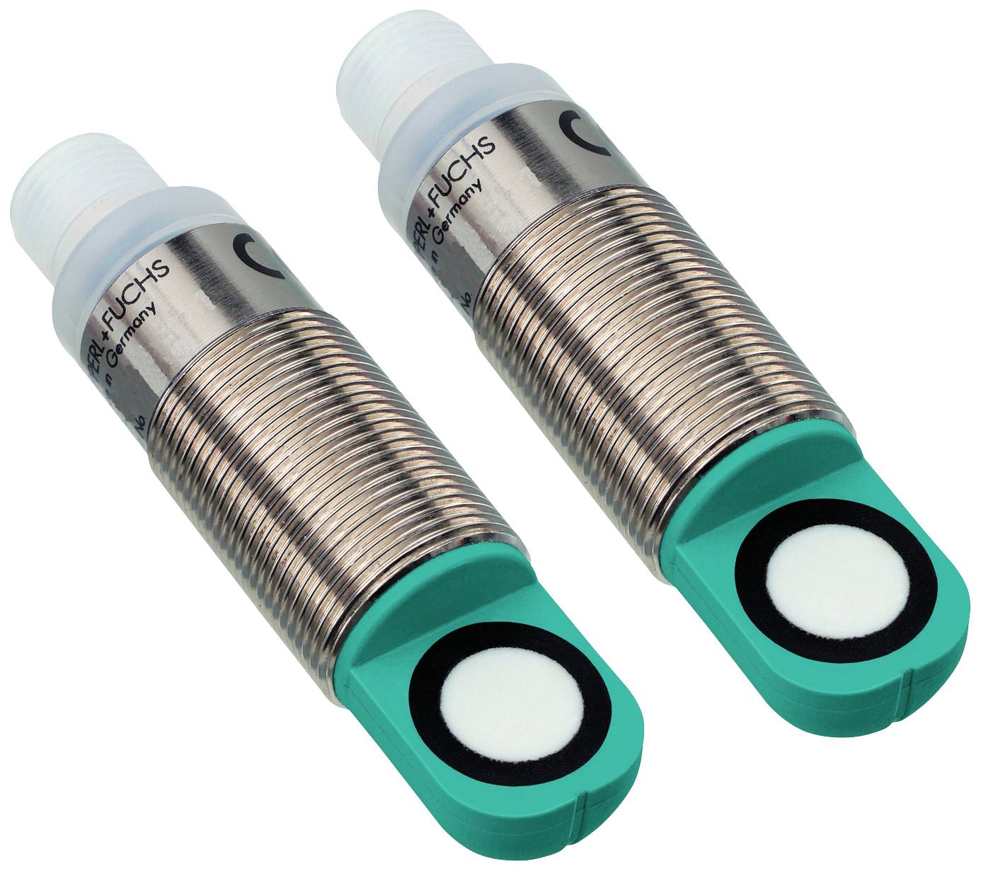 Due sensori cilindrici con involucro metallico e cappuccio verde. Marcature sulla superficie.