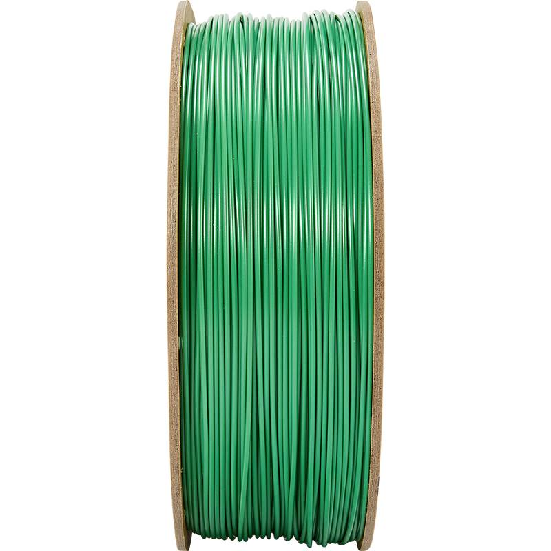 Un rocchetto di filamento verde in plastica per stampanti 3D, in piedi e visibile di lato, su uno sfondo bianco.