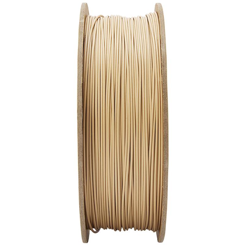 Una bobina con filamento beige per stampanti 3D, ripresa lateralmente, mostra i fili avvolti con tensione.
