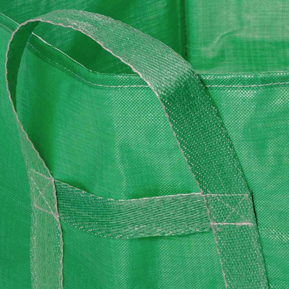 Una borsa della spesa riutilizzabile verde, realizzata in tessuto, con manico ben visibile.