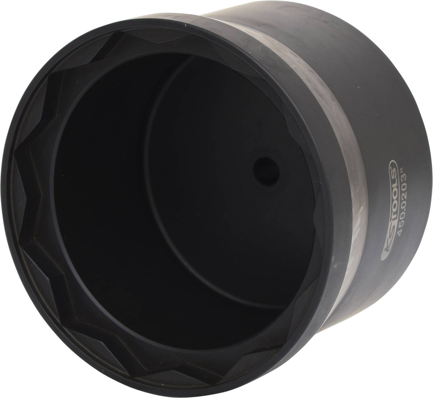 Cilindro nero con bordo dentellato, probabilmente parte di un dispositivo tecnico o di una macchina.