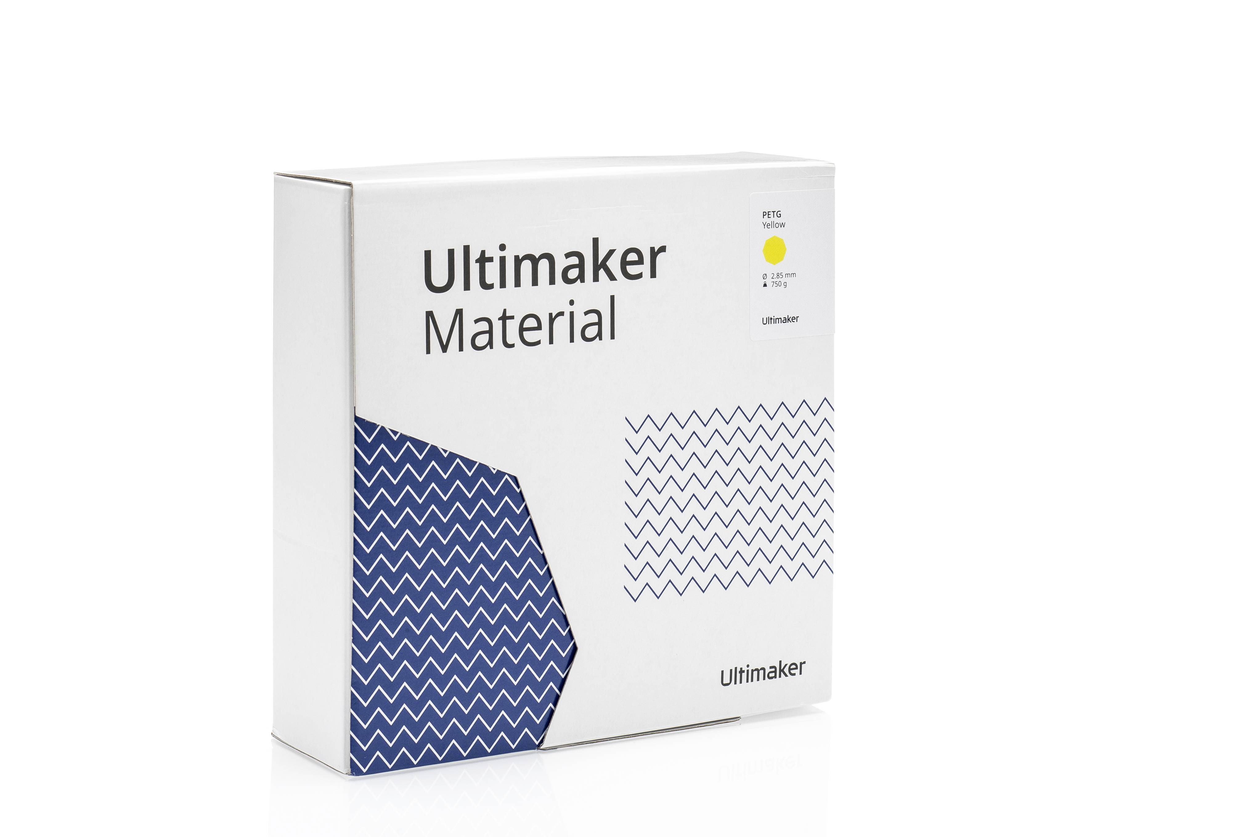 Un imballaggio con la scritta 'Ultimaker Material'. Ha un motivo a zigzag blu.