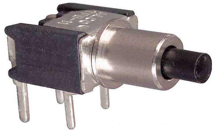 Un connettore elettrico metallico con molteplici minuscoli fori, utilizzato per connessioni pin ad alta densità, visualizzato accanto a un piccolo componente cilindrico.