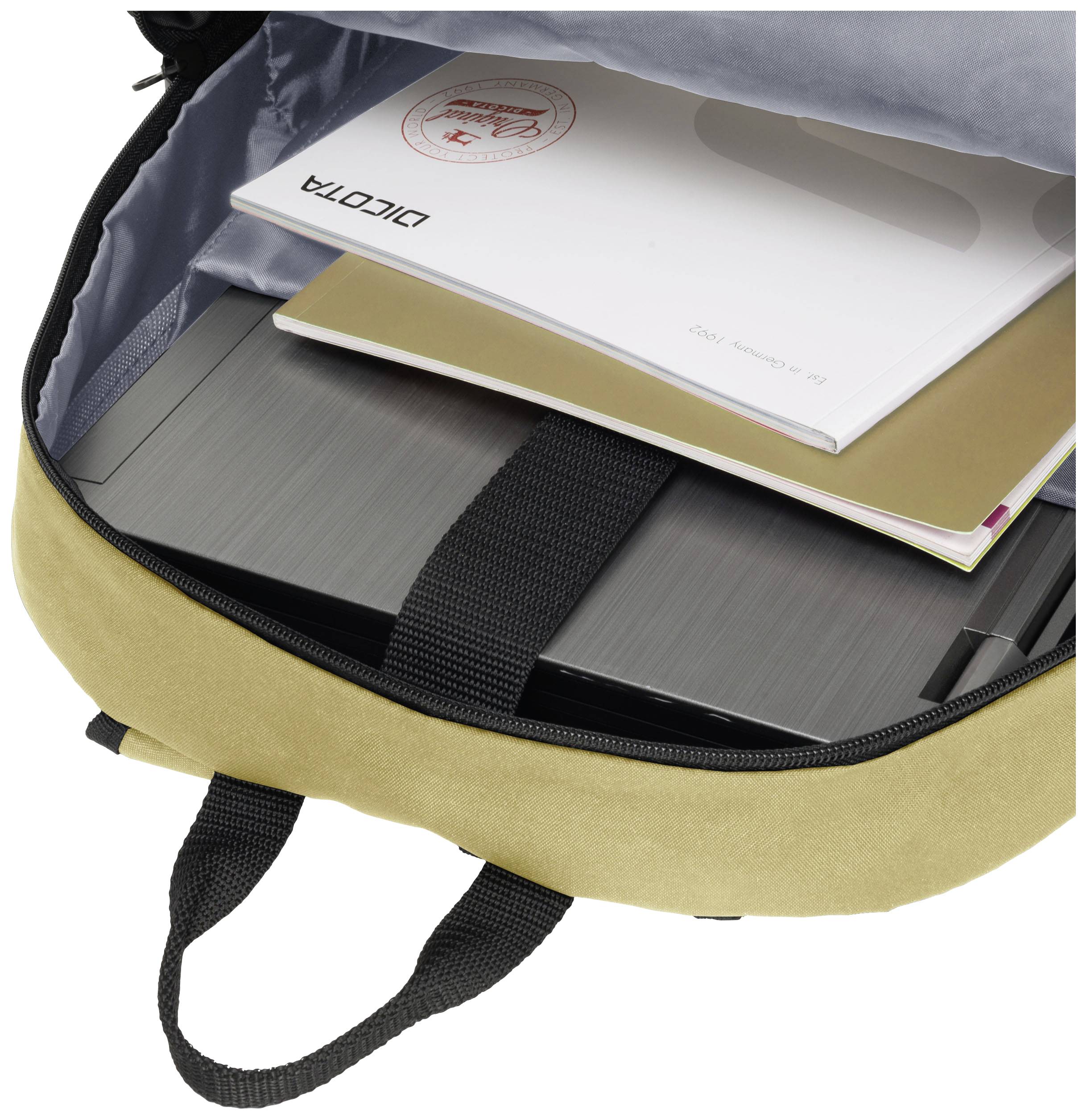 Uno zaino aperto con un laptop, quaderni e un documento timbrato.