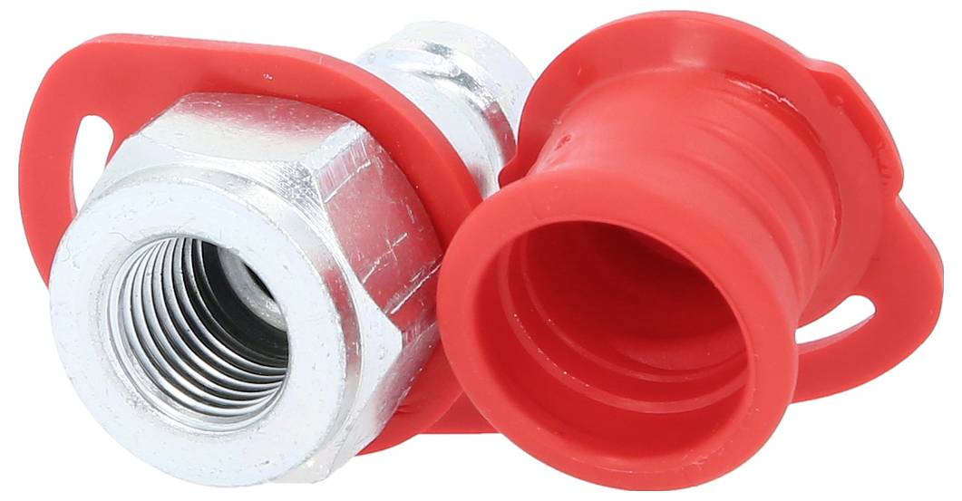 Cappuccio in plastica rossa accanto a un dado metallico argentato con filettatura interna. Sono adatti per chiudere e proteggere i raccordi.