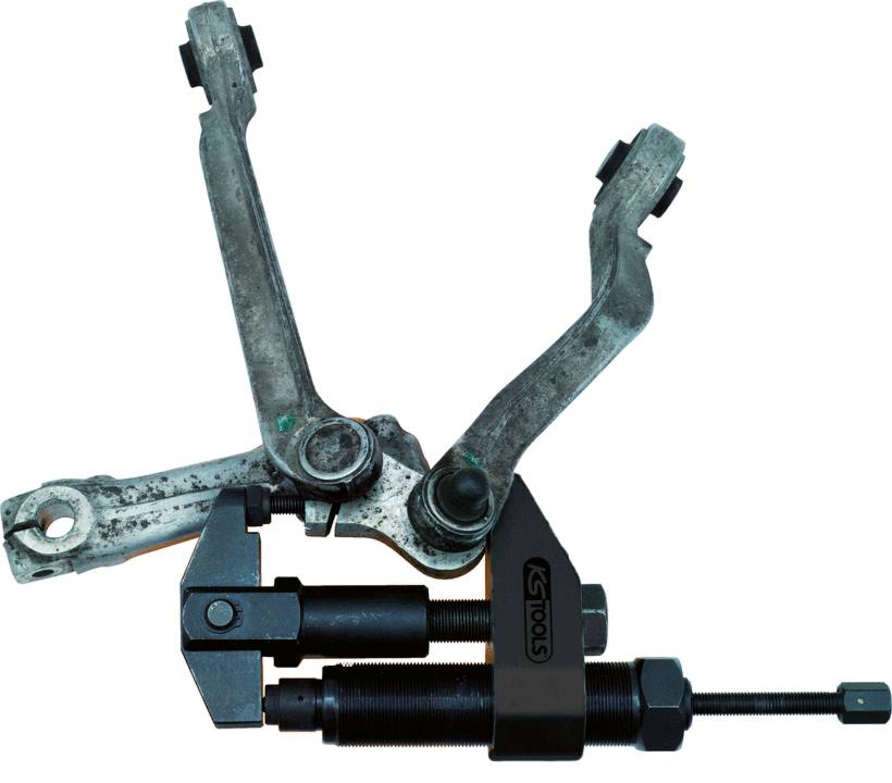 Un utensile speciale per rimuovere e inserire teste di tiranti; mostra bracci metallici e un meccanismo a vite.