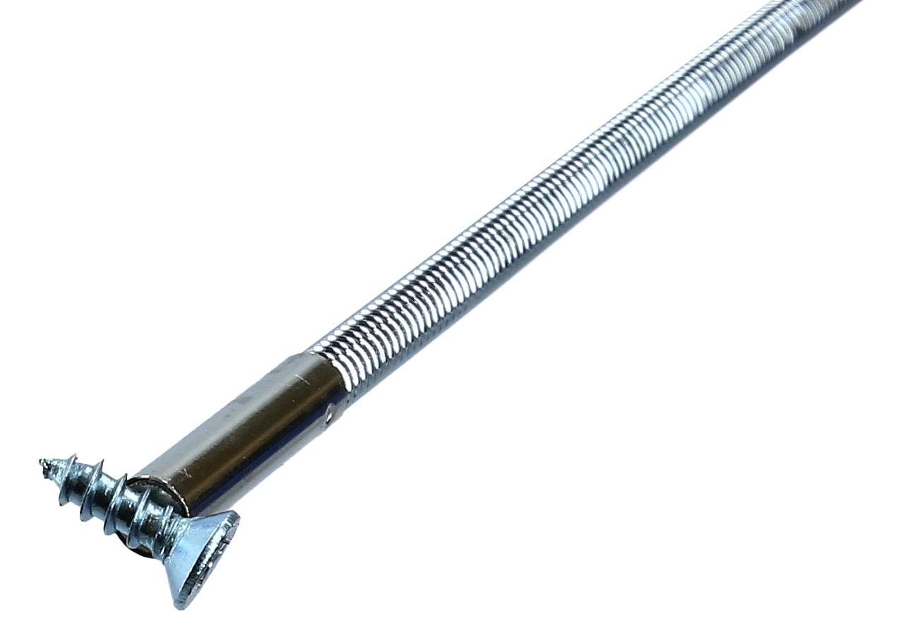 Vite e molla metalliche in primo piano. La vite ha una testa a croce ed è parzialmente inserita in una molla metallica.
