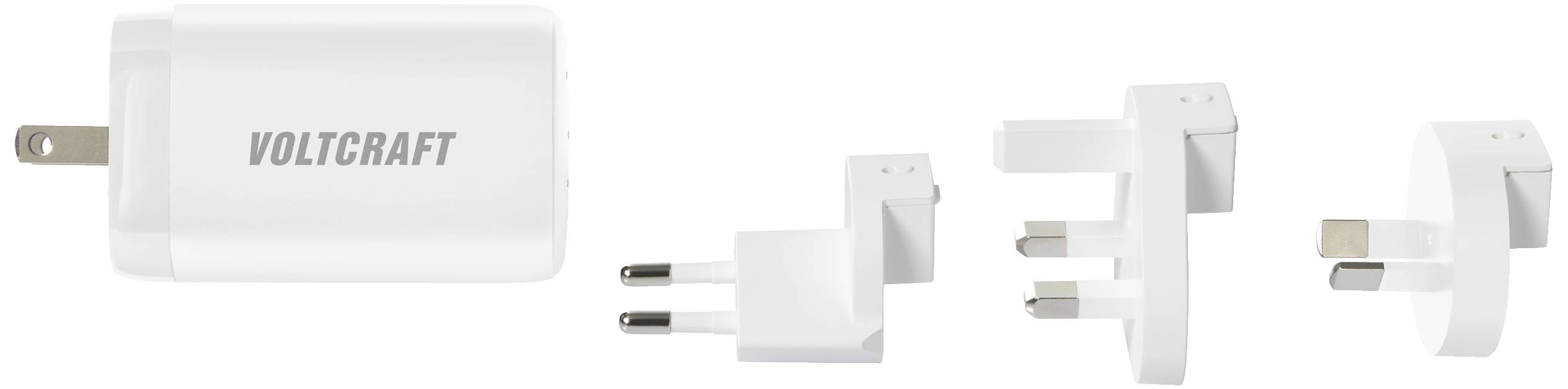 Un caricabatterie USB bianco di Voltcraft con quattro diversi adattatori intercambiabili per uso internazionale.
