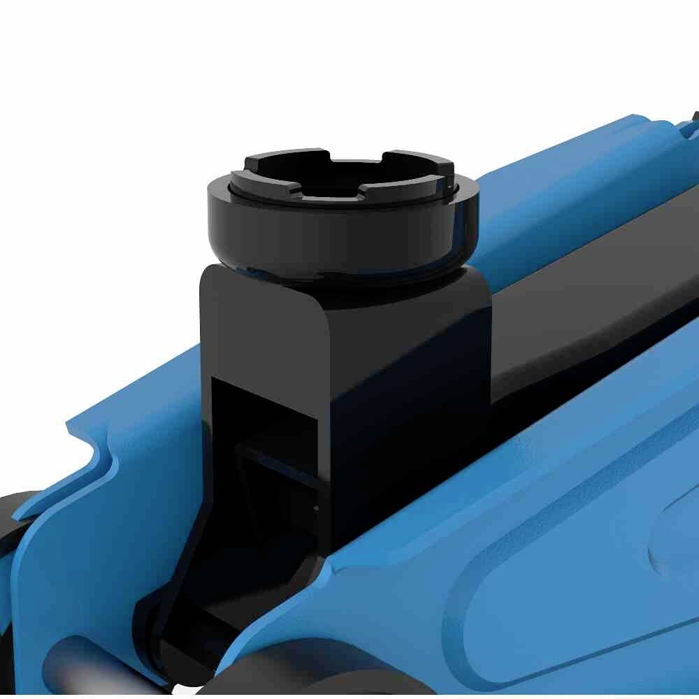 Un contenitore in plastica blu con un tappo di chiusura nero in alto a sinistra, probabilmente parte di un dispositivo tecnico più grande.