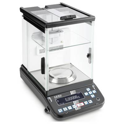 Una bilancia digitale di precisione con custodia protettiva trasparente; il display mostra '0,00000'. Adatta per misurazioni precise in laboratorio.