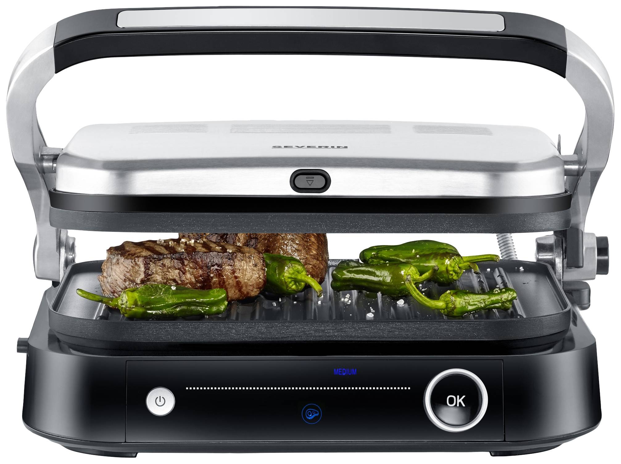 Un grill elettrico con coperchio aperto, sta cucinando pezzi di carne e peperoni verdi su una superficie grigliata scanalata.