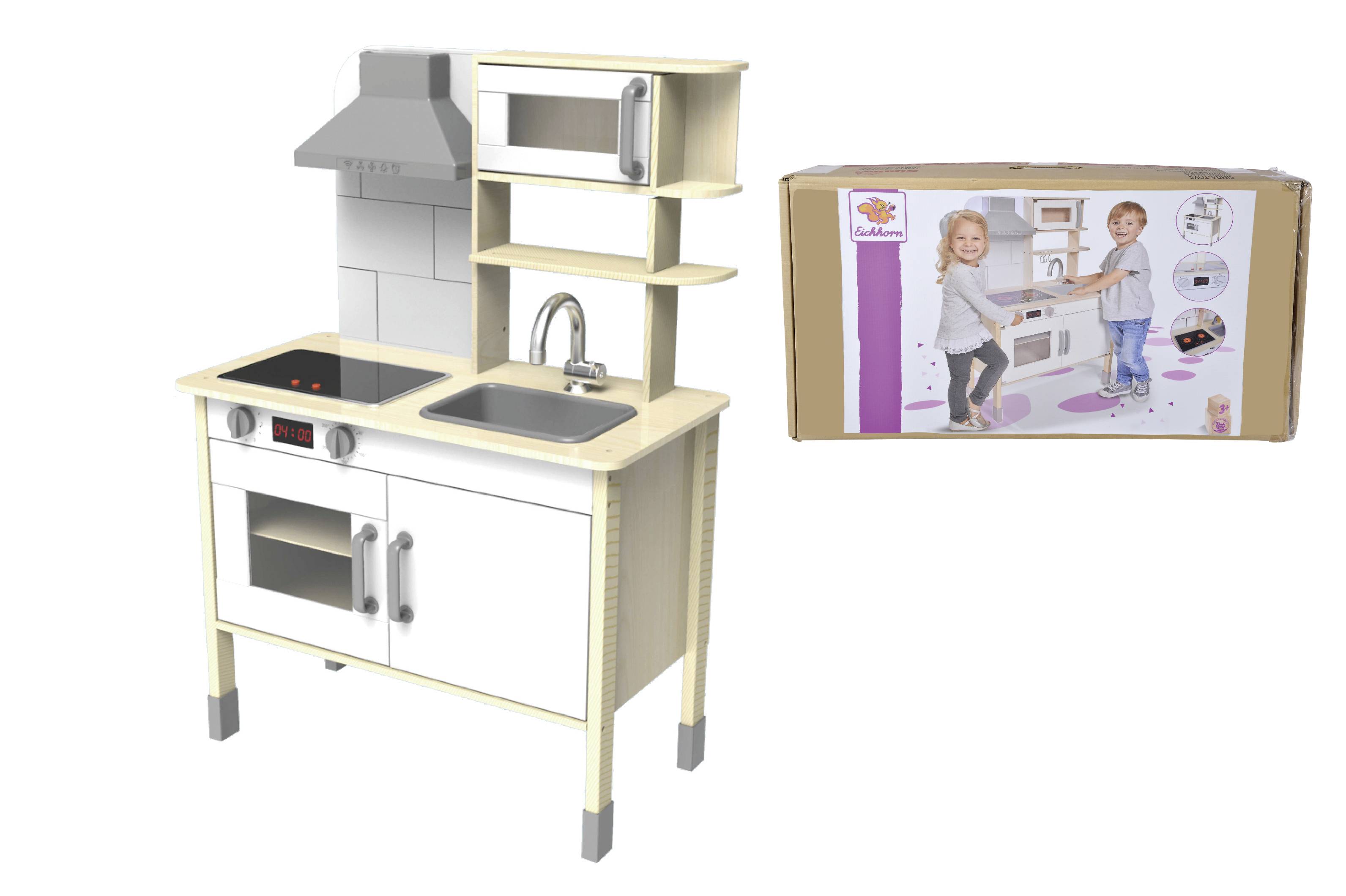 Cucina giocattolo con fornello, lavello e scaffale. Sulla confezione: due bambini che giocano con essa, dimostrano le funzioni della cucina.