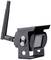 Una telecamera nera wireless con antenna in un angolo diagonale, montata su un piedistallo rettangolare.