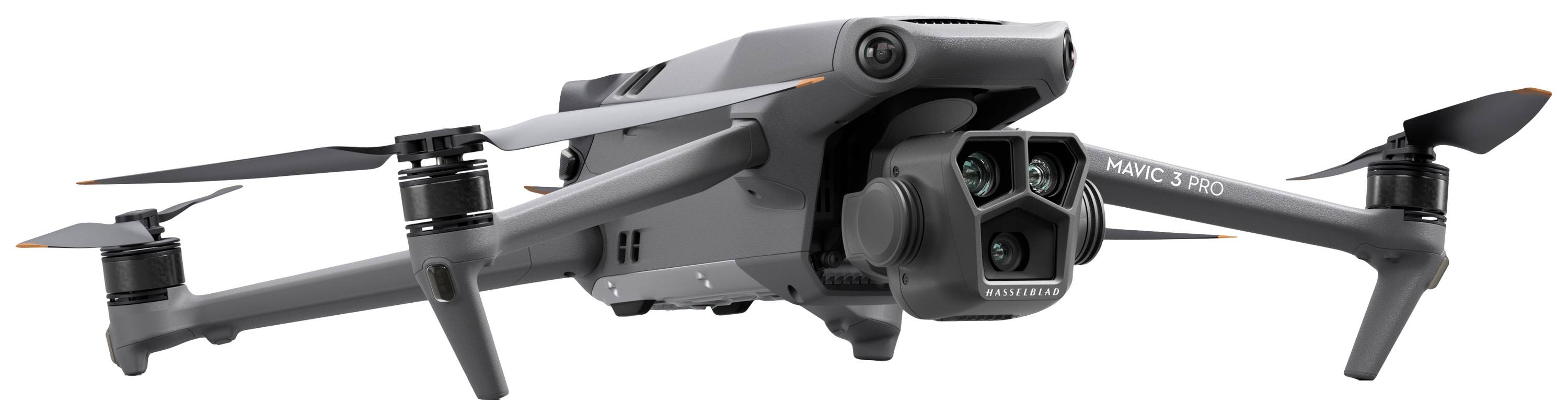 Drone grigia con quattro rotori e fotocamera. La vista laterale mostra dettagli tecnici e design aerodinamico. Pensare all'impiego del drone.