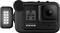 Fotocamera d'azione nera con luce LED laterale, schermo che mostra '4K 60W'.